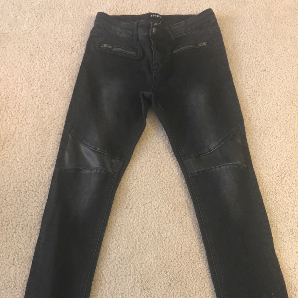 Black skinny jeans with leather detail